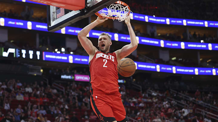 Apr 2, 2025; Houston, Texas, USA; Houston Rockets center Jock Landale (2) dunks the ball during the fourth quarter against the Utah Jazz at Toyota Center. Mandatory Credit: Troy Taormina-Imagn Images