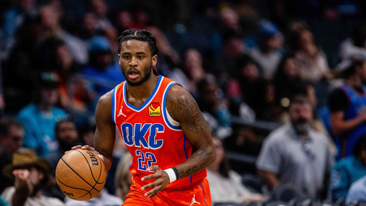 Apr 7, 2024; Charlotte, North Carolina, USA; Oklahoma City Thunder guard Cason Wallace (22) brings the ball up court against the Charlotte Hornets at Spectrum Center. Mandatory Credit: Scott Kinser-Imagn Images