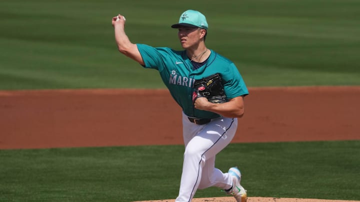Mar 14, 2024; Peoria, Arizona, USA; Seattle Mariners starting pitcher Bryan Woo (22) pitches against