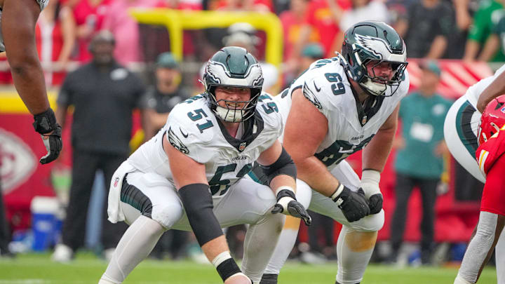 Sep 14, 2025; Kansas City, Missouri, USA; Philadelphia Eagles center Cam Jurgens (51) and guard Landon Dickerson (69) at the line of scrimmage against the Kansas City Chiefs during the second half of the game at GEHA Field at Arrowhead Stadium. Mandatory Credit: Denny Medley-Imagn Images