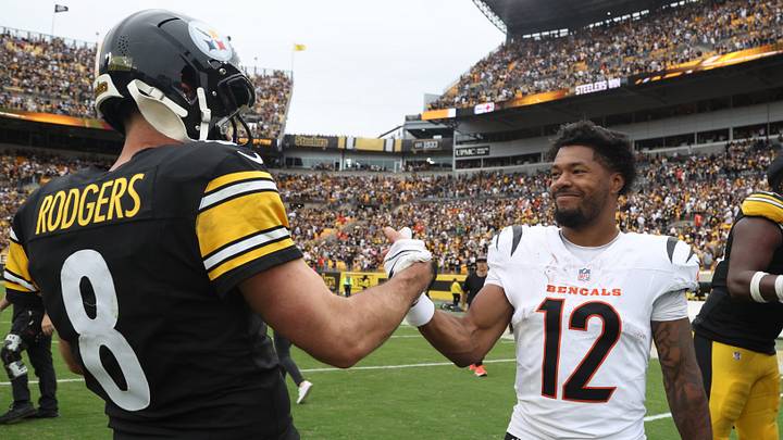 Sep 27, 2026; Pittsburgh, Pennsylvania, USA;  Cincinnati Bengals wide receiver Ke'Shawn Williams (12) greets Pittsburgh Steelers quarterback Aaron Rodgers (8) after a game at Acrisure Stadium.  Mandatory Credit: Charles LeClaire-Imagn Images