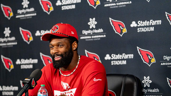 Josh Sweat speaks to members of the media at the Arizona Cardinals Training Center in Tempe on March 13, 2025.