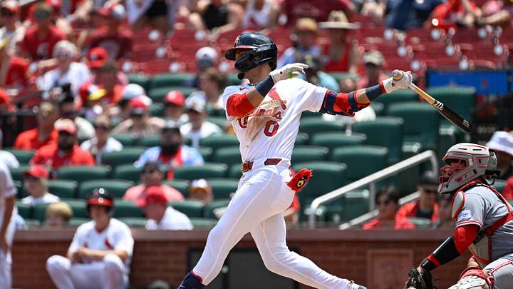 Jul 26, 2026; St. Louis, Missouri, USA; St. Louis Cardinals shortstop Masyn Winn (0) hits a single against the Cincinnati Reds in the second inning at Busch Stadium. Mandatory Credit: Joe Puetz-Imagn Images
