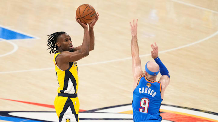 Jun 22, 2025; Oklahoma City, Oklahoma, USA; Indiana Pacers guard Andrew Nembhard (2) jumps for a shot during the second quarter against the Oklahoma City Thunder during game seven of the 2025 NBA Finals at Paycom Center. Mandatory Credit: Alonzo Adams-Imagn Images