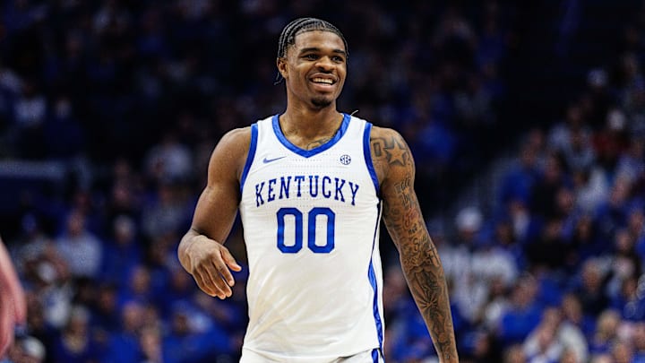 Feb 4, 2026; Lexington, Kentucky, USA; Kentucky Wildcats guard Otega Oweh (00) smiles during the second half against the Oklahoma Sooners at Rupp Arena at Central Bank Center. Mandatory Credit: Jordan Prather-Imagn Images