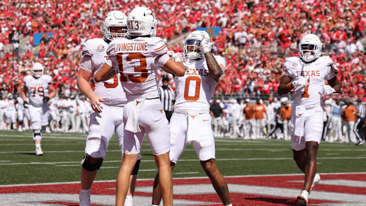 Aug 30, 2025; Columbus, Ohio, USA; Texas Longhorns wide receiver Parker Livingstone (13) reacts after scoring a touchdown against the Ohio State Buckeyes in the second half at Ohio Stadium. Mandatory Credit: Joseph Maiorana-Imagn Images