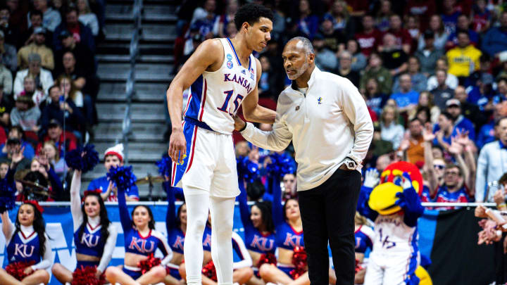 Kansas acting head coach Norm Roberts talks with Kevin McCullar Jr. during an NCAA men  s basketball tournament second round basketball game on Saturday, March 18, 2023, at Wells Fargo Arena, in Des Moines, Iowa.