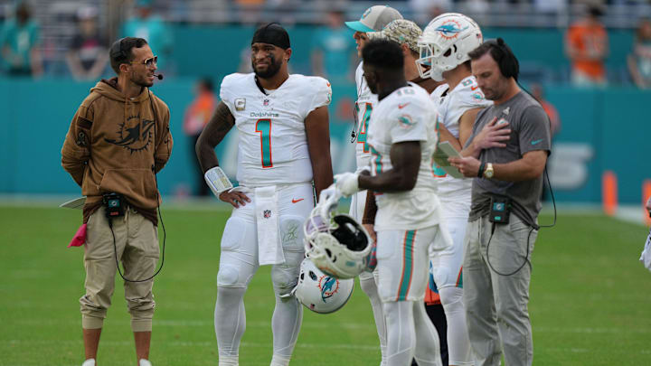 Miami Dolphins head coach Mike McDaniel talks with quarterback Tua Tagovailoa (1) during the first Miami Dolphins head coach Mike McDaniel talks with quarterback Tua Tagovailoa (1) during the first