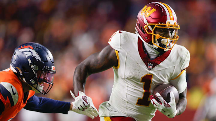 Washington Commanders wide receiver Deebo Samuel (1) carries the ball after a reception Washington Commanders wide receiver Deebo Samuel (1) carries the ball after a reception