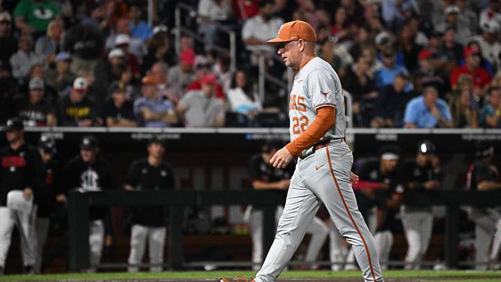 Jun 13, 2026; Omaha, NE, USA; Texas Longhorns head coach Jim Schlossnagle walks to the dugout against the Georgia Bulldogs during the seventh inning at Charles Schwab Field. Mandatory Credit: Steven Branscombe-Imagn Images Jun 13, 2026; Omaha, NE, USA; Texas Longhorns head coach Jim Schlossnagle walks to the dugout against the Georgia Bulldogs during the seventh inning at Charles Schwab Field. Mandatory Credit: Steven Branscombe-Imagn Images