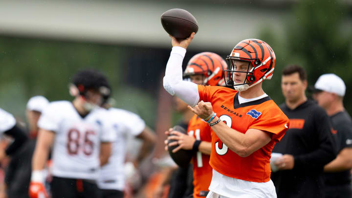 Cincinnati Bengals quarterback Joe Burrow (9) throws a pass at Cincinnati Bengals training camp on the Kettering Health Practice Fields in Cincinnati on Sunday, July 28, 2024. Cincinnati Bengals quarterback Joe Burrow (9) throws a pass at Cincinnati Bengals training camp on the Kettering Health Practice Fields in Cincinnati on Sunday, July 28, 2024.