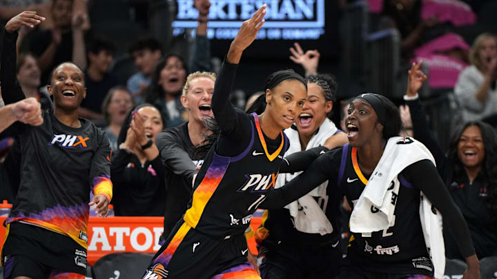 Aug 22, 2025; Phoenix, Arizona, USA; The Phoenix Mercury reacts after forward DeWanna Bonner (14) scores against the Golden State Valkyries in the second half at Footprint Center. Mandatory Credit: Rick Scuteri-Imagn Images
