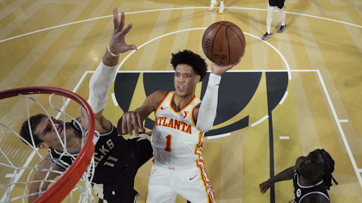 Dec 14, 2024; Las Vegas, Nevada, USA; Atlanta Hawks forward Jalen Johnson (1) shoots against Milwaukee Bucks center Brook Lopez (11) during the second half in a semifinal of the 2024 Emirates NBA Cup at T-Mobile Arena. Mandatory Credit: Kyle Terada/Pool Photo-Imagn Images