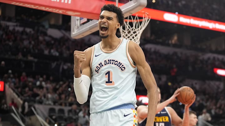 Jan 4, 2025; San Antonio, Texas, USA; San Antonio Spurs center Victor Wembanyama (1) reacts after drawing a foul while scoring against the Denver Nuggets during the first half at Frost Bank Center. Jan 4, 2025; San Antonio, Texas, USA; San Antonio Spurs center Victor Wembanyama (1) reacts after drawing a foul while scoring against the Denver Nuggets during the first half at Frost Bank Center.