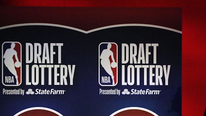 May 12, 2025; Chicago, Illinois, US; A person watches the 2025 NBA Draft Lottery at McCormick Place. Mandatory Credit: David Banks-Imagn Images