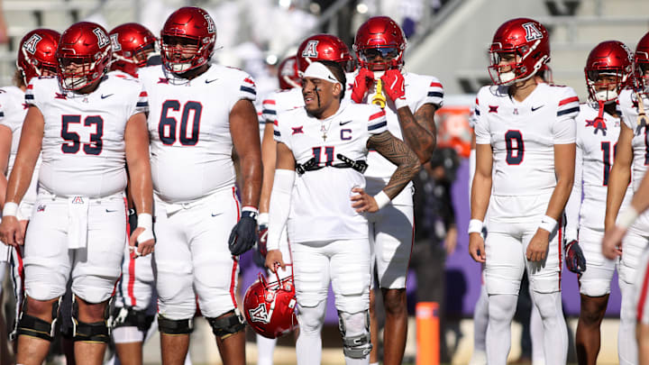 Nov 23, 2024; Fort Worth, Texas, USA; Arizona Wildcats quarterback Noah Fifita (11) stands on the field before the game against the TCU Horned Frogs at Amon G. Carter Stadium Nov 23, 2024; Fort Worth, Texas, USA; Arizona Wildcats quarterback Noah Fifita (11) stands on the field before the game against the TCU Horned Frogs at Amon G. Carter Stadium