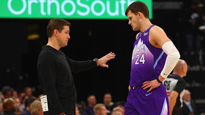 Jan 25, 2025; Memphis, Tennessee, USA; Utah Jazz head coach Will Hardy talks with center Walker Kessler (24) during the first quarter against the Memphis Grizzlies at FedExForum. Mandatory Credit: Petre Thomas-Imagn Images