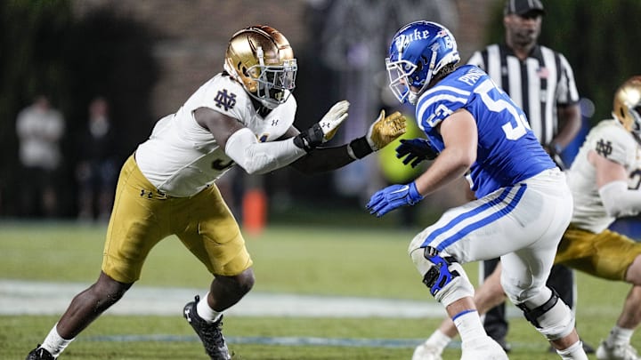 Sep 30, 2023; Durham, North Carolina, USA; Notre Dame Fighting Irish defensive lineman Nana Osafo-Mensah (31) against Duke Blue Devils offensive lineman Brian Parker II (53) during the second half at Wallace Wade Stadium. Mandatory Credit: Jim Dedmon-Imagn Images