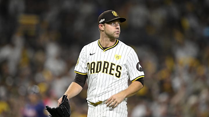 Oct 1, 2024; San Diego, California, USA; San Diego Padres pitcher Michael King (34) walks off the field after the sixth inning against the Atlanta Braves in game one of the Wildcard round for the 2024 MLB Playoffs at Petco Park. Mandatory Credit: Denis Poroy-Imagn Images