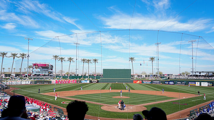 Fans gather to watch a Cactus League game between the Cincinnati Reds and Los Angeles Dodgers, Monday, Feb. 24, 2025, at Goodyear Ballpark in Goodyear, Ariz. Fans gather to watch a Cactus League game between the Cincinnati Reds and Los Angeles Dodgers, Monday, Feb. 24, 2025, at Goodyear Ballpark in Goodyear, Ariz.