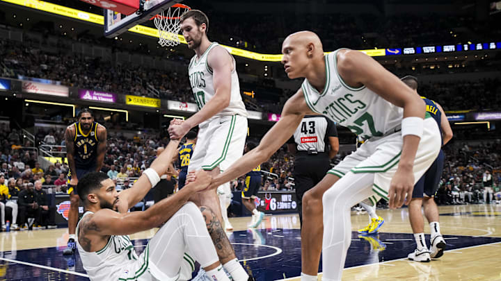 Oct 30, 2024; Indianapolis, Indiana, USA; Boston Celtics center Luke Kornet (40) and guard Jordan Walsh (27) help forward Jayson Tatum (0) up during a game against the Indiana Pacers at Gainbridge Fieldhouse. Mandatory Credit: Grace Smith-Imagn Images Oct 30, 2024; Indianapolis, Indiana, USA; Boston Celtics center Luke Kornet (40) and guard Jordan Walsh (27) help forward Jayson Tatum (0) up during a game against the Indiana Pacers at Gainbridge Fieldhouse. Mandatory Credit: Grace Smith-Imagn Images