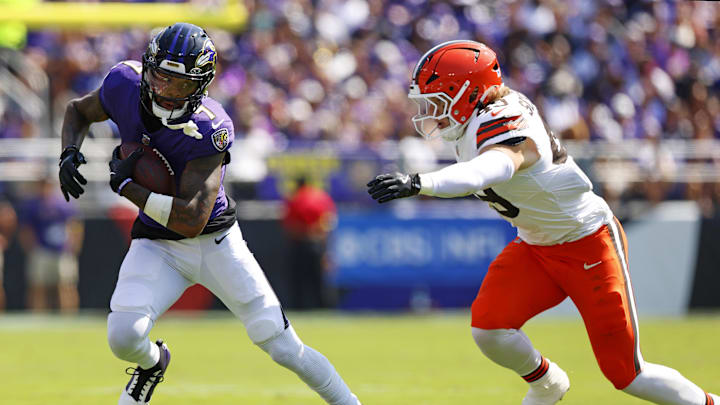 Sep 14, 2025; Baltimore, Maryland, USA; Baltimore Ravens wide receiver Rashod Bateman (7) runs the ball against Cleveland Browns linebacker Carson Schwesinger (49) during the second quarter at M&T Bank Stadium. Mandatory Credit: Peter Casey-Imagn Images Sep 14, 2025; Baltimore, Maryland, USA; Baltimore Ravens wide receiver Rashod Bateman (7) runs the ball against Cleveland Browns linebacker Carson Schwesinger (49) during the second quarter at M&T Bank Stadium. Mandatory Credit: Peter Casey-Imagn Images