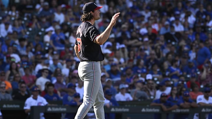 Sep 21, 2024; Chicago, Illinois, USA;  Washington Nationals pitcher Kyle Finnegan (67) reacts after a game against the Chicago Cubs at Wrigley Field. 