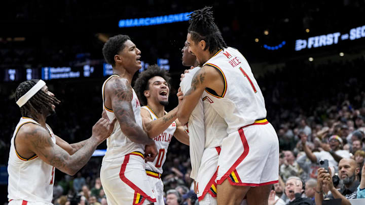 Mar 23, 2025; Seattle, WA, USA; Maryland Terrapins center Derik Queen (25) celebrates with teammates after scoring the game-winning shot against the Colorado State Rams at Climate Pledge Arena. Mandatory Credit: Stephen Brashear-Imagn Images