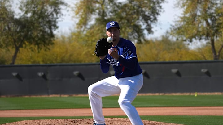Feb 14, 2025; Glendale, AZ, USA; Los Angeles Dodgers pitcher Blake Snell (7) fields a ground ball during a Spring Training workout at Camelback Ranch. Mandatory Credit: Joe Camporeale-Imagn Images Feb 14, 2025; Glendale, AZ, USA; Los Angeles Dodgers pitcher Blake Snell (7) fields a ground ball during a Spring Training workout at Camelback Ranch. Mandatory Credit: Joe Camporeale-Imagn Images
