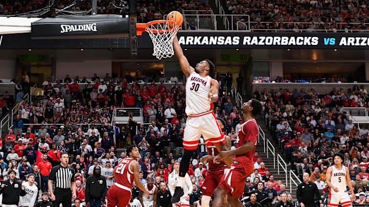 Mar 26, 2026; San Jose, CA, USA; Arizona Wildcats forward Tobe Awaka (30) goes up for two against Arkansas Razorbacks guard Billy Richmond III (24) in the second half during a Sweet Sixteen game of the West Regional of the men's 2026 NCAA Tournament at SAP Center. Mandatory Credit: Eakin Howard-Imagn Images