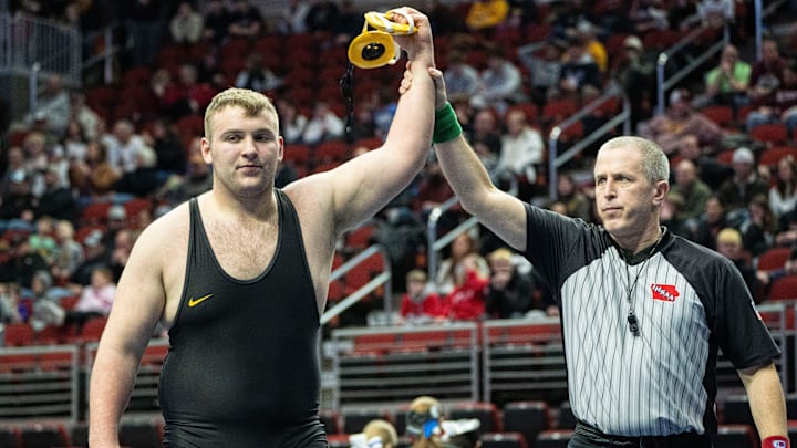 Cooper Martinson of Southeast Polk won the heavyweight title in Class 3A, helping the Rams to a team crown.
