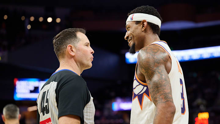 Dec 28, 2024; San Francisco, California, USA; Phoenix Suns guard Bradley Beal (3) talks with referee Brian Forte (45) during the fourth quarter at Chase Center. 