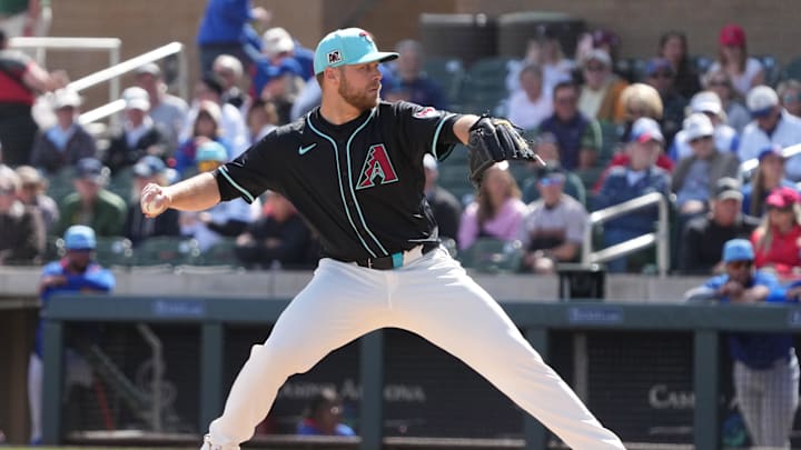 Mar 3, 2025; Salt River Pima-Maricopa, Arizona, USA; Arizona Diamondbacks pitcher Corbin Burnes (39) throws against the Chicago Cubs in the first inning at Salt River Fields at Talking Stick. 