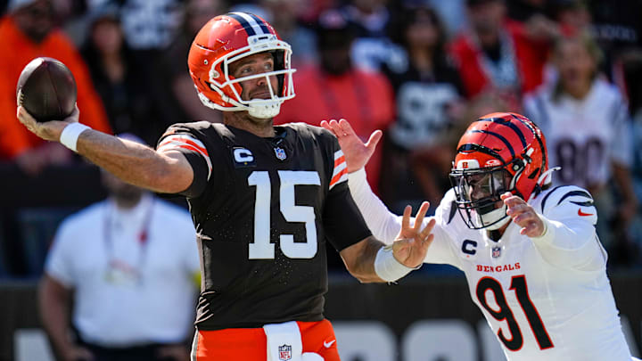 Cleveland Browns quarterback Joe Flacco (15) is chased through the end zone by Cincinnati Bengals defensive end Trey Hendrickson (91) in the fourth quarter of the NFL Week 1 game between the Cleveland Browns and the Cincinnati Bengals at Huntington Bank Field in Cleveland on Sunday, Sept. 7, 2025. The Bengals begin the season with a 17-16 win over the Browns.