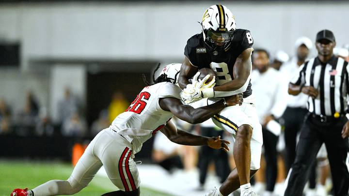 Sep 5, 2026; Nashville, Tennessee, USA; Vanderbilt Commodores tight end Jayvontay Conner (8) leaps while running the ball against Austin Peay Governors defensive back Quan Peterson (9) during the second half at FirstBank Stadium. Mandatory Credit: Steve Roberts-Imagn Images Sep 5, 2026; Nashville, Tennessee, USA; Vanderbilt Commodores tight end Jayvontay Conner (8) leaps while running the ball against Austin Peay Governors defensive back Quan Peterson (9) during the second half at FirstBank Stadium. Mandatory Credit: Steve Roberts-Imagn Images
