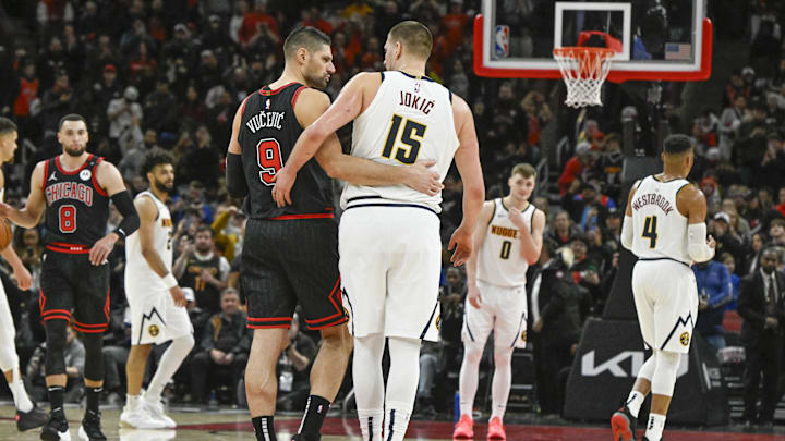 Jan 27, 2025; Chicago, Illinois, USA; Chicago Bulls center Nikola Vucevic (9) and Denver Nuggets center Nikola Jokic (15) hug after a game at the United Center. Mandatory Credit: Matt Marton-Imagn Images Jan 27, 2025; Chicago, Illinois, USA; Chicago Bulls center Nikola Vucevic (9) and Denver Nuggets center Nikola Jokic (15) hug after a game at the United Center. Mandatory Credit: Matt Marton-Imagn Images