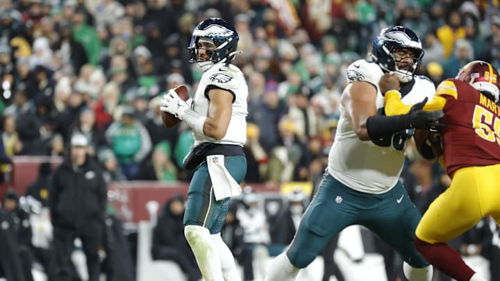 Dec 20, 2025; Landover, Maryland, USA; Philadelphia Eagles quarterback Jalen Hurts (1) looks to pass against the Washington Commanders during the second half at Northwest Stadium. 
