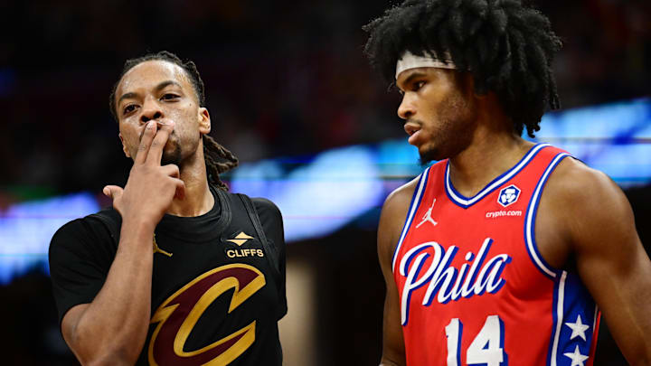 Dec 21, 2024; Cleveland, Ohio, USA; Cleveland Cavaliers guard Darius Garland (10) celebrates after hitting a three point basket as Philadelphia 76ers guard Ricky Council IV (14) looks on during the second half at Rocket Mortgage FieldHouse. Mandatory Credit: Ken Blaze-Imagn Images