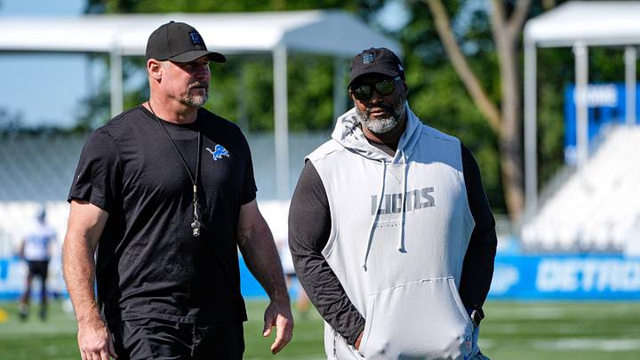 Detroit Lions head coach Dan Campbell, left, and general manager Brad Holmes walk off the field after practice during training camp at Meijer Performance Center in Allen Park on Wednesday, July 29, 2026.