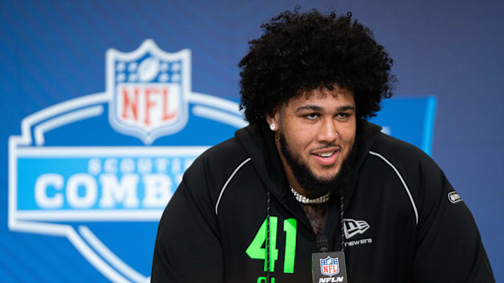 Feb 28, 2026; Indianapolis, IN, USA; Alabama offensive lineman Kadyn Proctor (OL41) speaks to members of the media during the NFL Combine at the Indiana Convention Center. Mandatory Credit: Jacob Musselman-Imagn Images