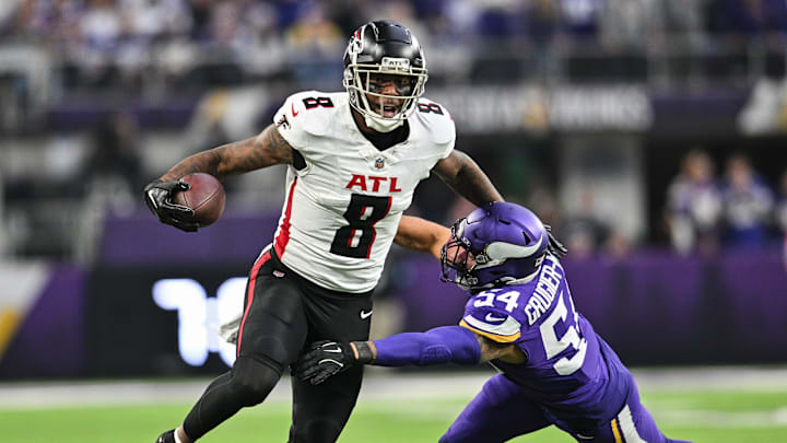 Dec 8, 2024; Minneapolis, Minnesota, USA; Atlanta Falcons tight end Kyle Pitts (8) gets yards after the catch as Minnesota Vikings linebacker Kamu Grugier-Hill (54) attempts to make the tackle during the fourth quarter at U.S. Bank Stadium. Mandatory Credit: Jeffrey Becker-Imagn Images