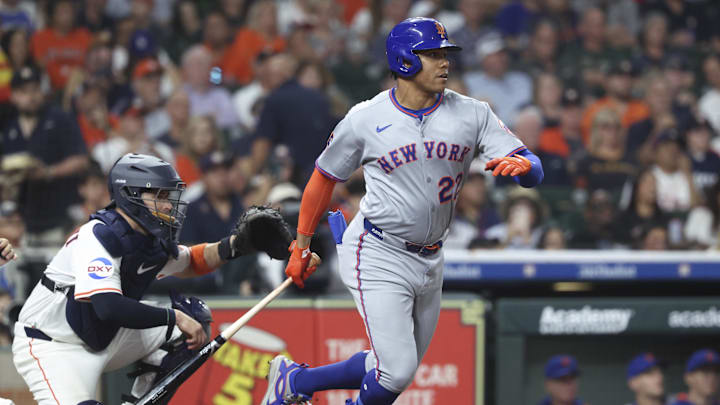 Mar 29, 2025; Houston, Texas, USA; New York Mets right fielder Juan Soto (22) hits a fielders choice resulting in a run scored during the sixth inning against the Houston Astros at Daikin Park. Mandatory Credit: Troy Taormina-Imagn Images