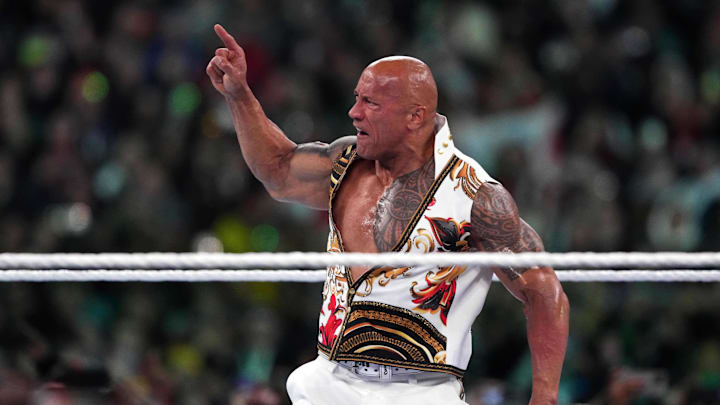 Apr 7, 2024; Philadelphia, PA, USA; The Rock interferes during the WWE Universal Championship match between Roman Reigns and Cody Rhodes during Wrestlemania XL Sunday at Lincoln Financial Field. Mandatory Credit: Joe Camporeale-Imagn Images
