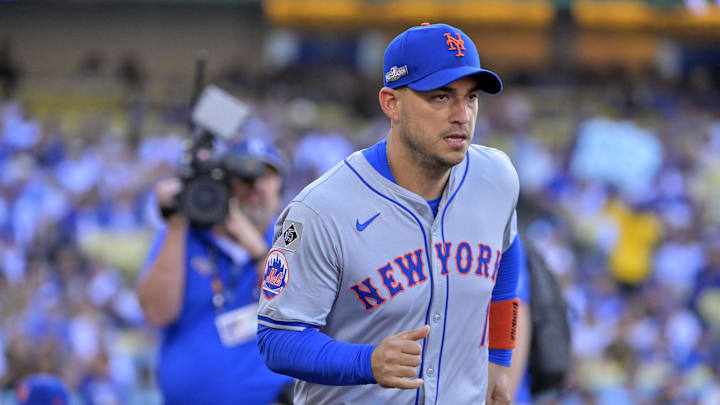 Oct 13, 2024; Los Angeles, California, USA; New York Mets second base Jose Iglesias (11) takes the field before game one of the NLCS for the 2024 MLB Playoffs at Dodger Stadium. Mandatory Credit: Jayne Kamin-Oncea-Imagn Images Oct 13, 2024; Los Angeles, California, USA; New York Mets second base Jose Iglesias (11) takes the field before game one of the NLCS for the 2024 MLB Playoffs at Dodger Stadium. Mandatory Credit: Jayne Kamin-Oncea-Imagn Images