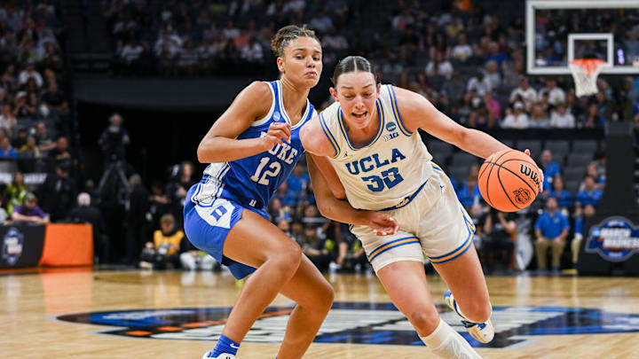 Mar 29, 2026; Sacramento, CA, USA; UCLA Bruins forward Angela Dugalić (32) drives to the basket against Duke Blue Devils forward Delaney Thomas (12) during the second quarter in the Sacramento Regional 4 of the women's 2026 NCAA Tournament at the Golden 1 Center. Mandatory Credit: Ed Szczepanski-Imagn Images Mar 29, 2026; Sacramento, CA, USA; UCLA Bruins forward Angela Dugalić (32) drives to the basket against Duke Blue Devils forward Delaney Thomas (12) during the second quarter in the Sacramento Regional 4 of the women's 2026 NCAA Tournament at the Golden 1 Center. Mandatory Credit: Ed Szczepanski-Imagn Images