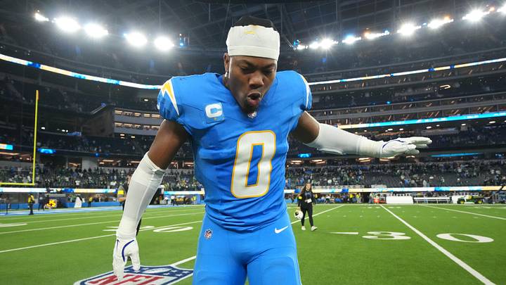 Dec 8, 2025; Inglewood, California, USA; Los Angeles Chargers linebacker Daiyan Henley (0) celebrates after defeating the Philadelphia Eagles in overtime at SoFi Stadium. Mandatory Credit: Kirby Lee-Imagn Images