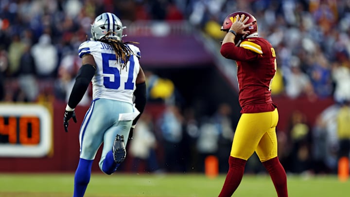 Nov 24, 2024; Landover, Maryland, USA; Washington Commanders place kicker Austin Seibert (3) reacts after missing a point after try during the fourth quarter against the Dallas Cowboys at Northwest Stadium.