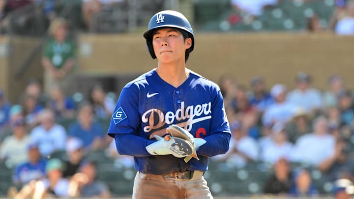 Feb 25, 2026; Salt River Pima-Maricopa, Arizona, USA; Los Angeles Dodgers second baseman Hyeseong Kim (6) looks on in the first inning against the Arizona Diamondbacks at Salt River Fields at Talking Stick. Mandatory Credit: Matt Kartozian-Imagn Images