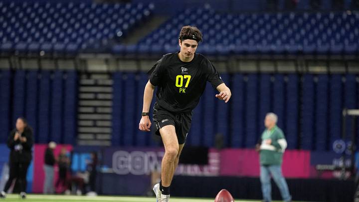 Feb 25, 2026; Indianapolis, IN, USA; Michigan place kicker Dominic Zvada (PK07) kicks the ball during the NFL Scouting Combine at Lucas Oil Stadium. Feb 25, 2026; Indianapolis, IN, USA; Michigan place kicker Dominic Zvada (PK07) kicks the ball during the NFL Scouting Combine at Lucas Oil Stadium.