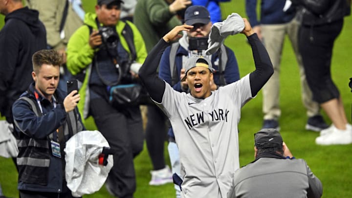 Oct 19, 2024; Cleveland, Ohio, USA; New York Yankees outfielder Juan Soto (22) celebrates after beating the Cleveland Guardians during game five of the ALCS for the 2024 MLB playoffs at Progressive Field. Mandatory Credit: David Richard-Imagn Images
